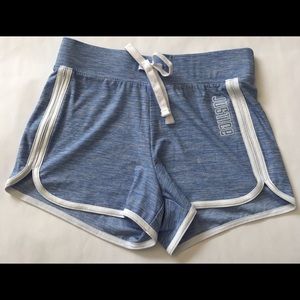 Justice Active girl Dolphin quick dry Shorts.